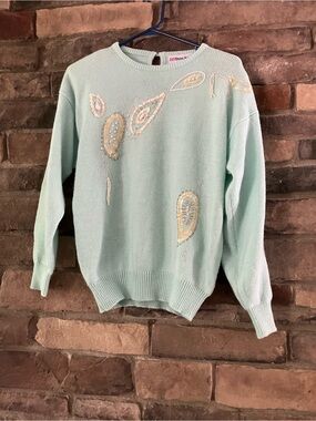 Vintage Dana Scott knit pullover in a mint green color featuring sequin